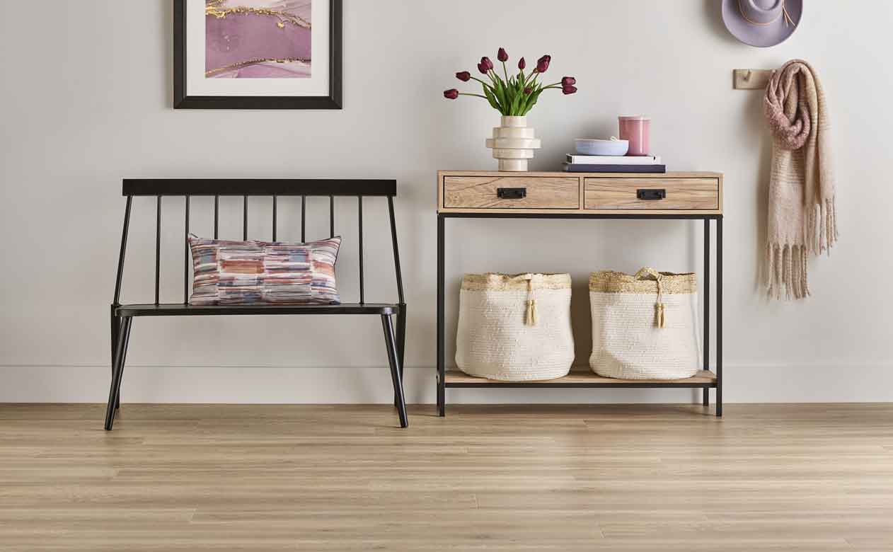 Laminate flooring in Dothan, AL in hallway with bench and table