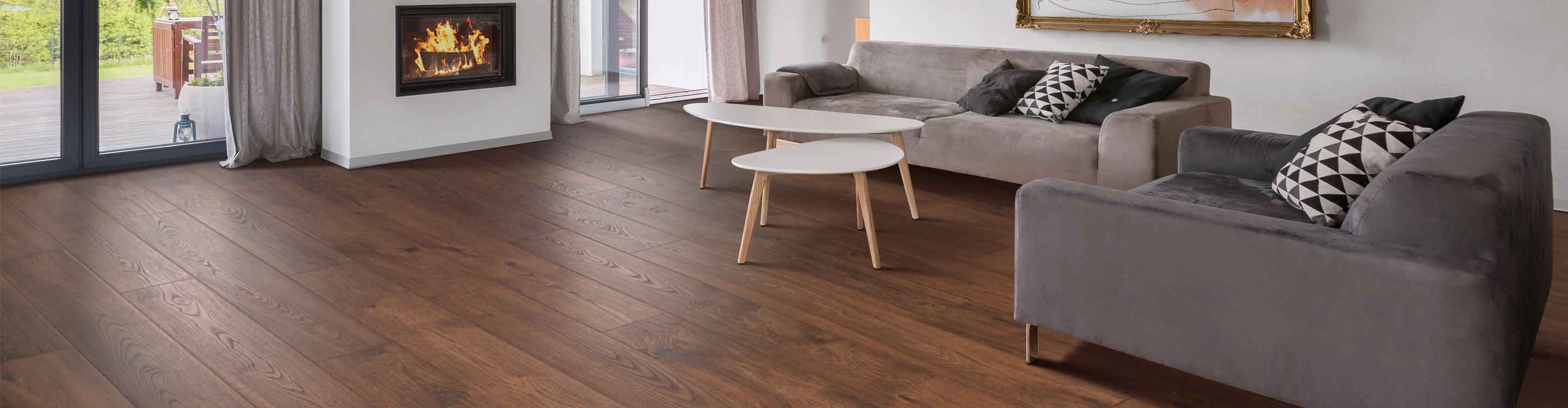 Laminate flooring in Dothan, AL, living room with furniture and fireplace