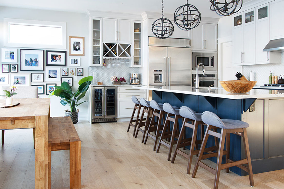 Open concept multifunctional kitchen and dining room with seating and storage